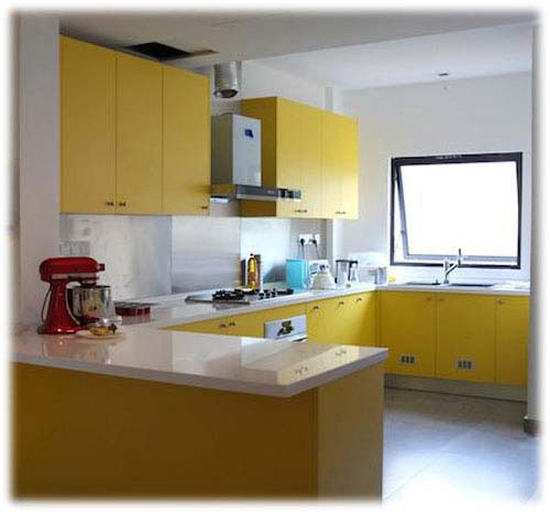 Yellow Kitchen Cabinet with U-shaped Layout